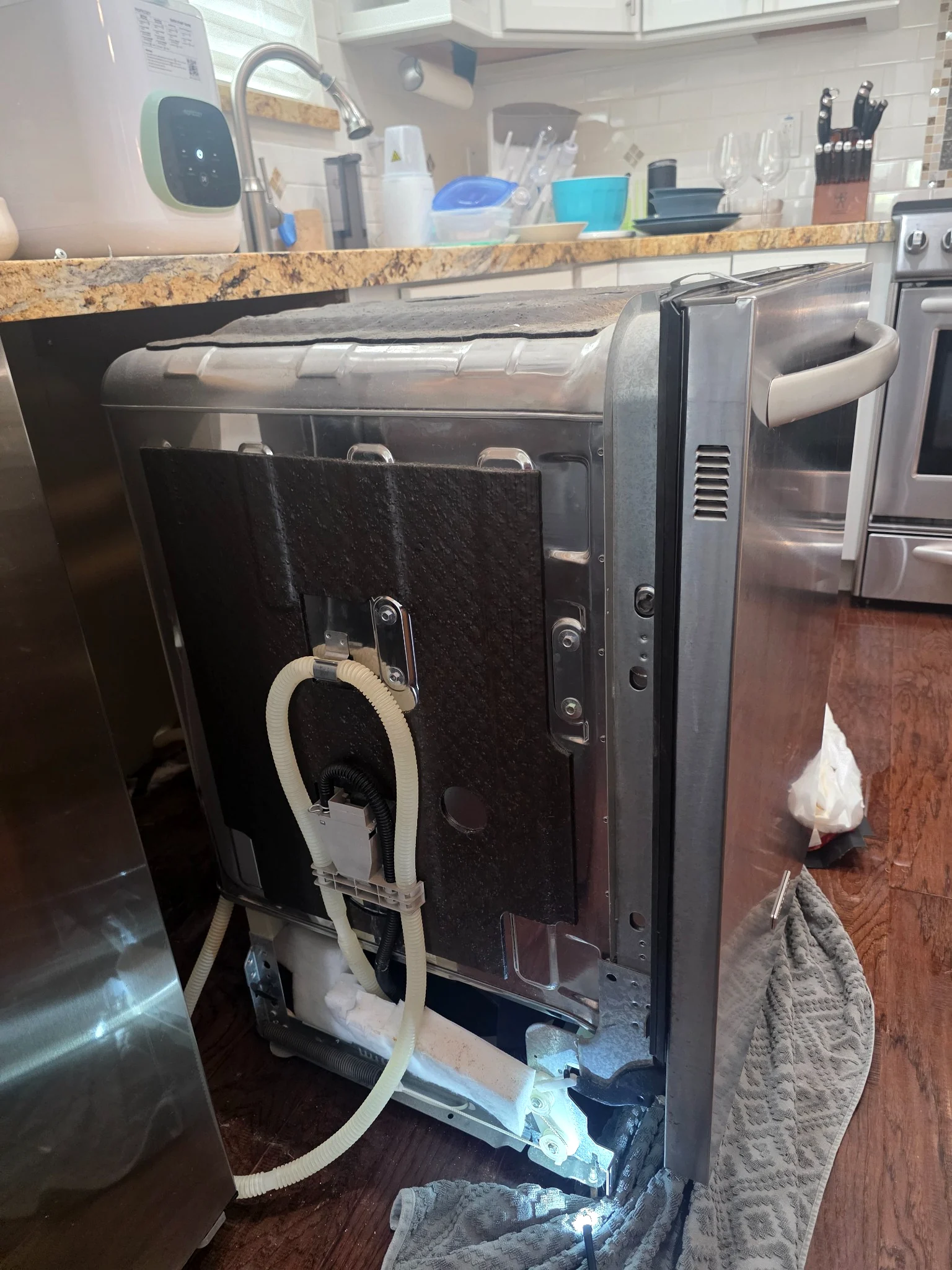 Open Bosch dishwasher during service diagnosis
