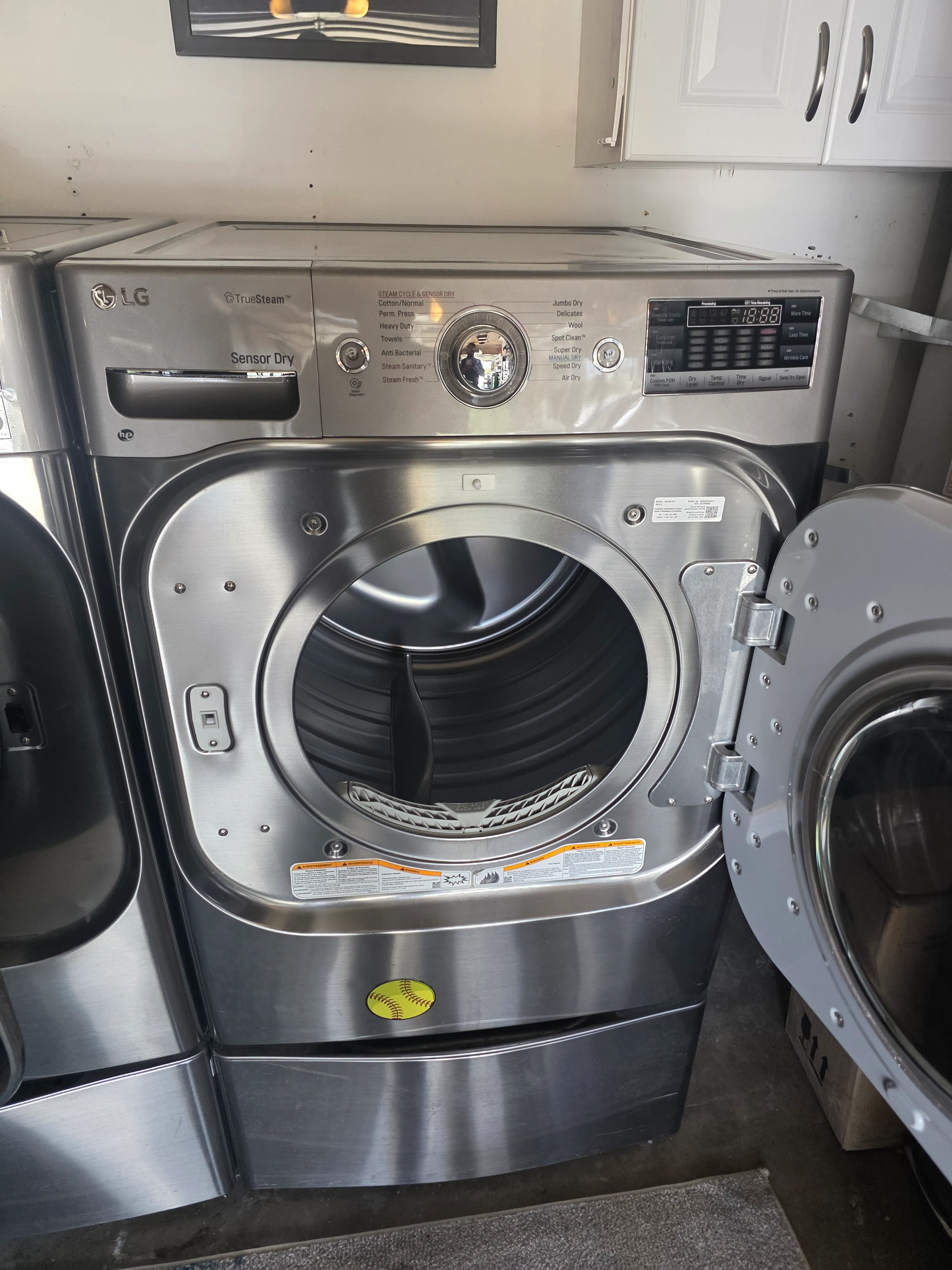 LG front-load dryer repair service in Los Angeles laundry room