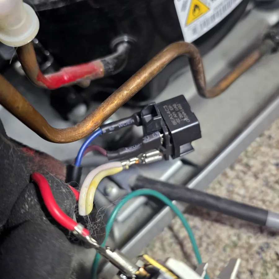 Refrigerator compressor start relay diagnostics and wiring inspection